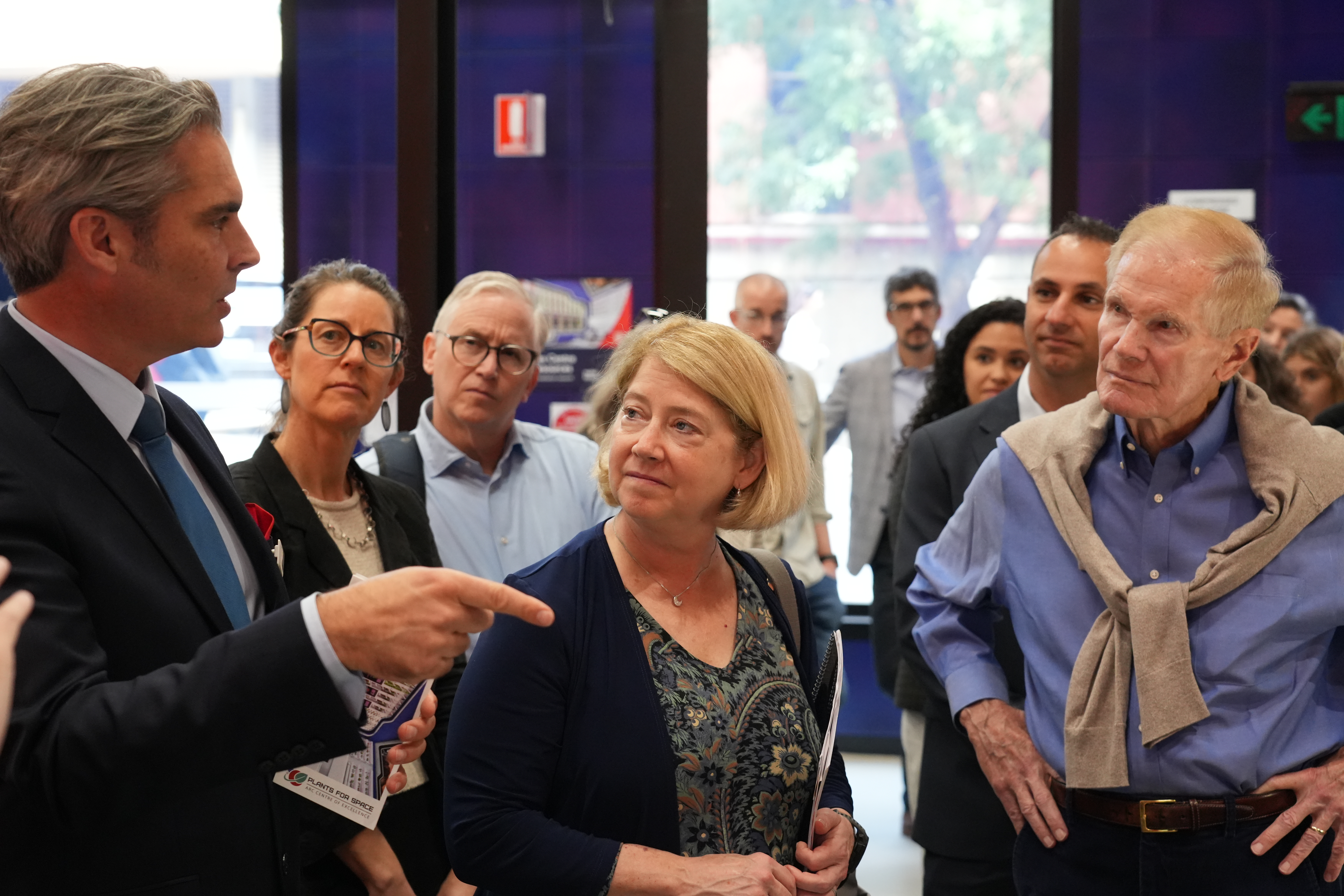 A group of people touring a laboratory