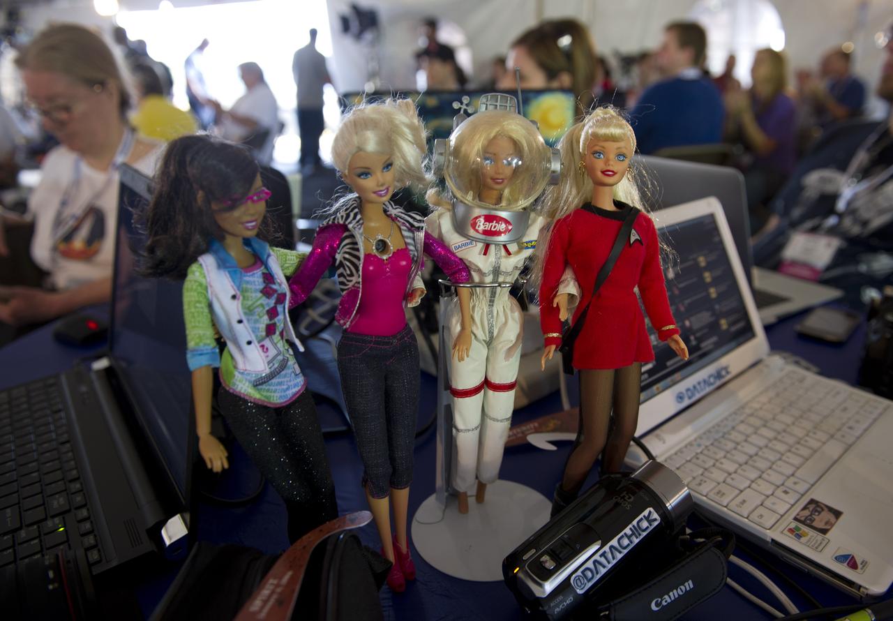 Barbie dolls in a space station