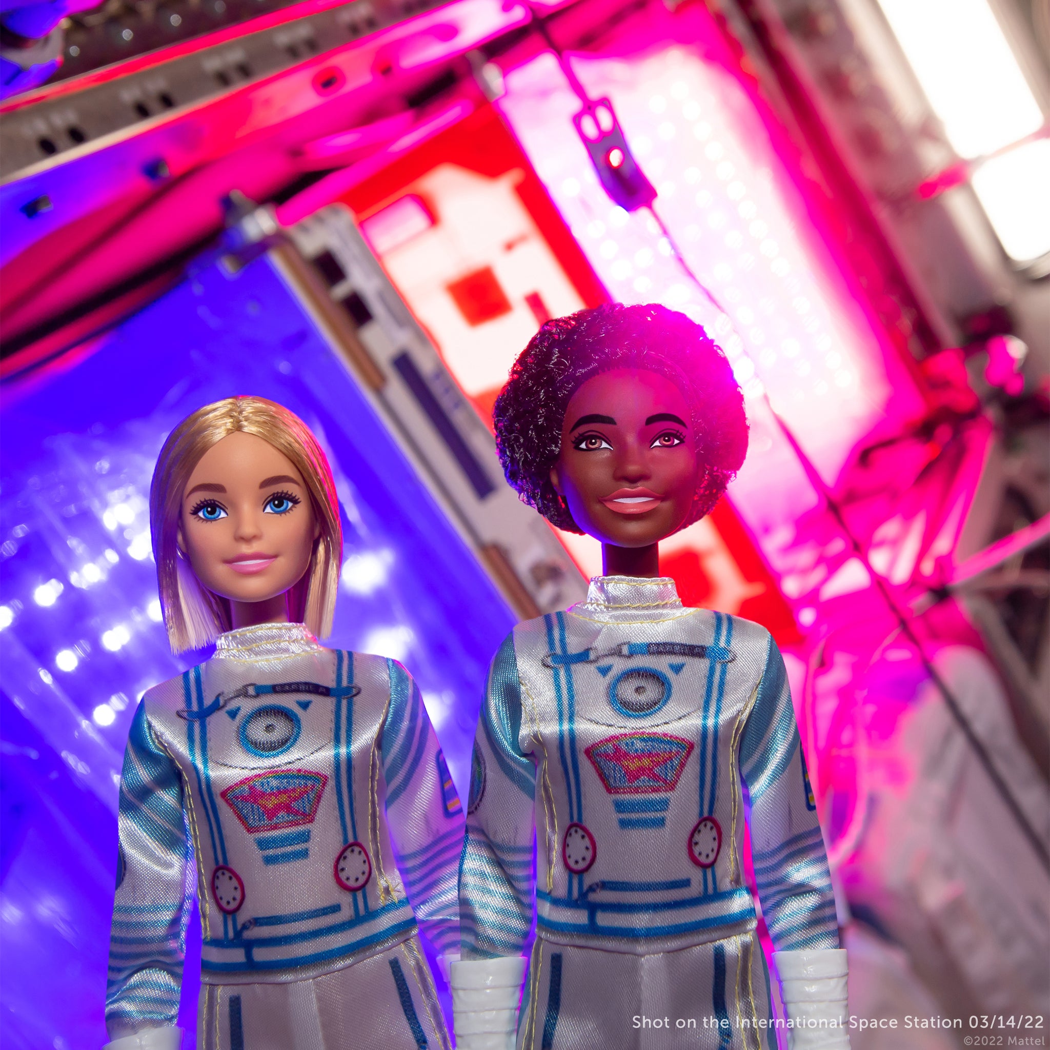 Barbie dolls in a space station