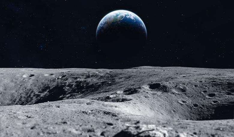 An out of space image from the perspective of the moon looking at earth.