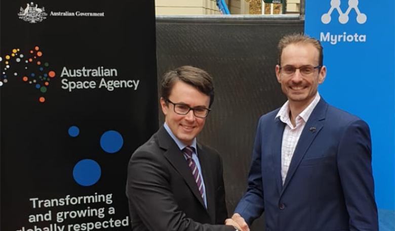 Photo of Myriota CEO and Australian Space Agency's Deputy Head shaking hands