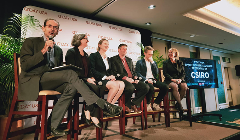 Photo of panel members on stage at the 35th Space Symposium