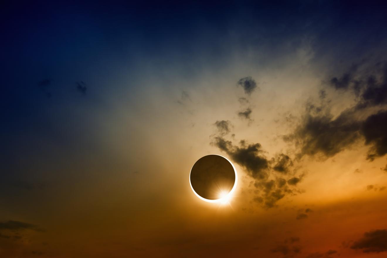 Twilight sky showing a partial solar eclipse