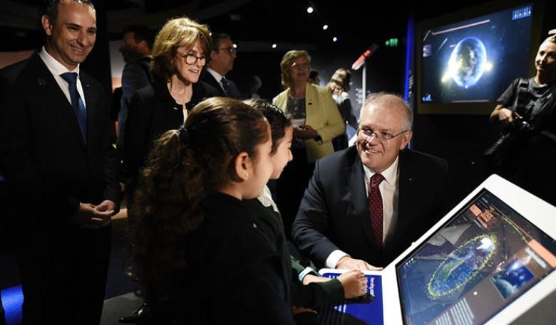 PM Scott Morison and other adults talking to school children