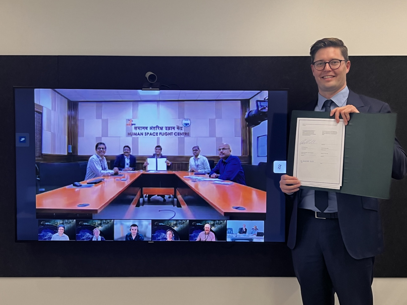 Australian Space Agency representative and ISRO representatives with the signed Implementing Agreement