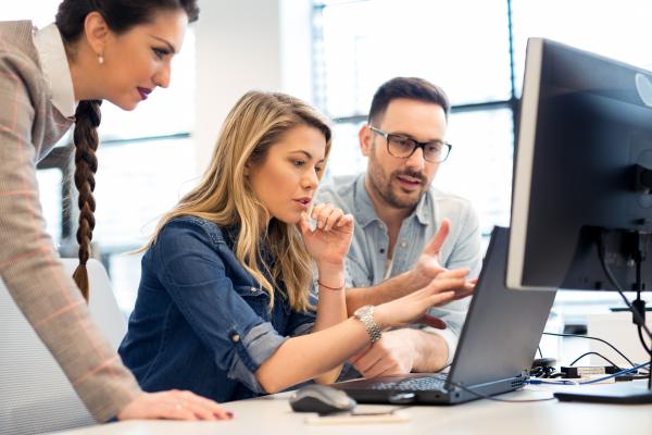 Meeting around laptop