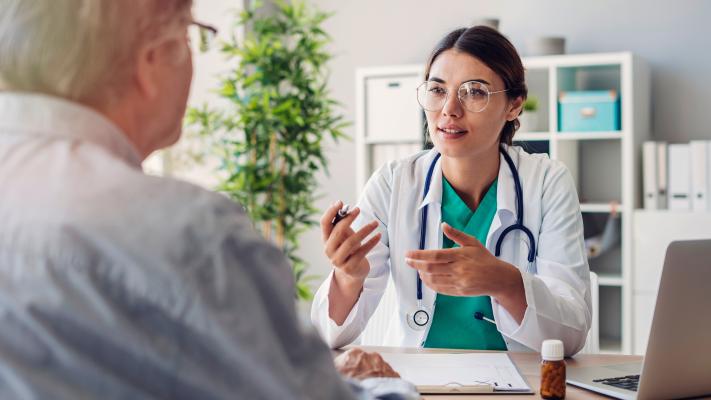 Doctor talking to patient