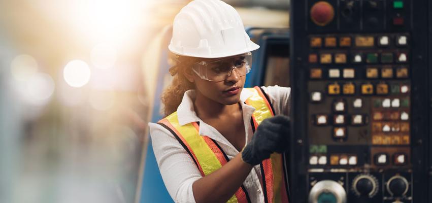 Av technician working in safety gear