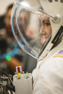 Person's headshot in an astronaut uniform