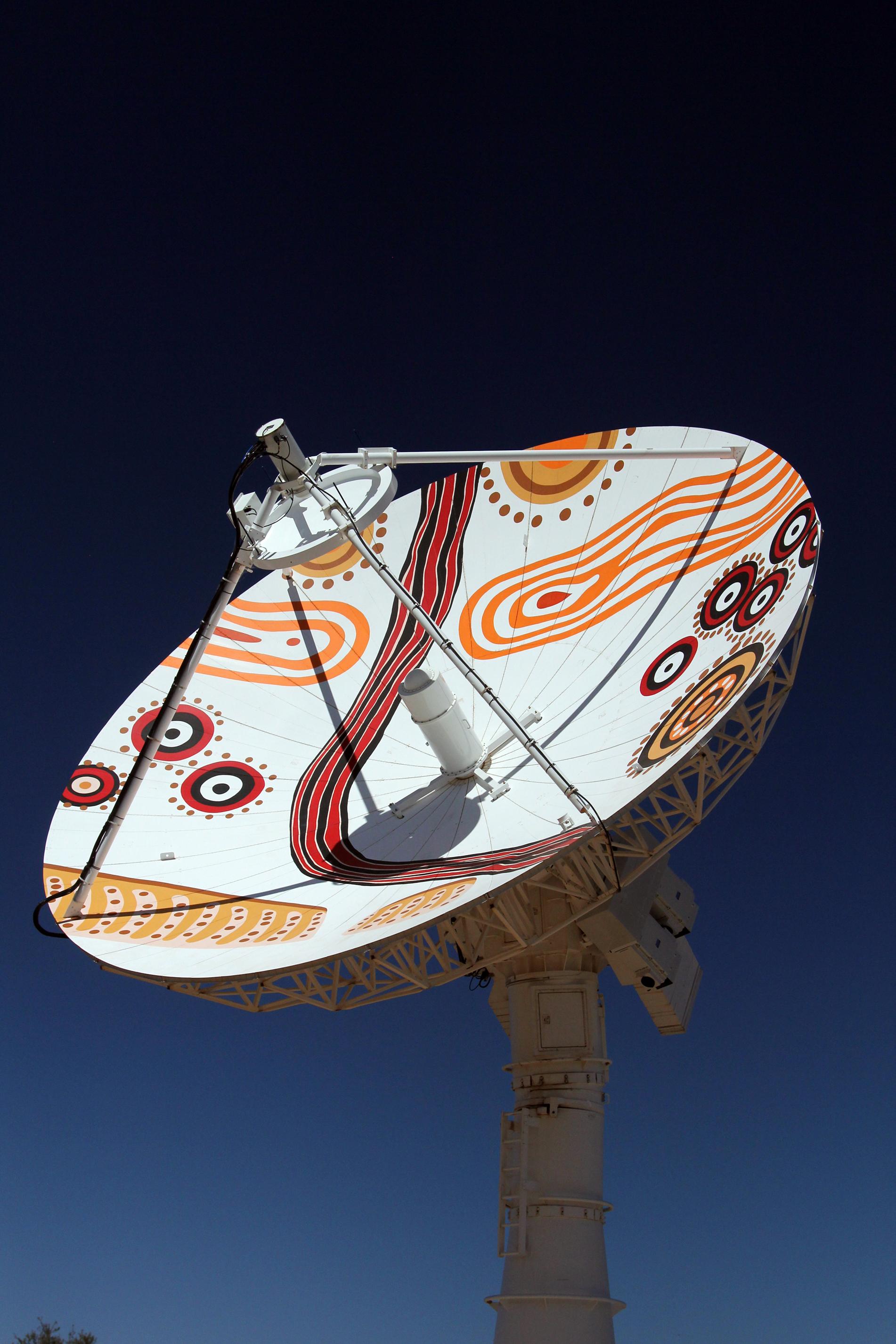 An Alice Springs satellite antenna painted with Indigenous artwork